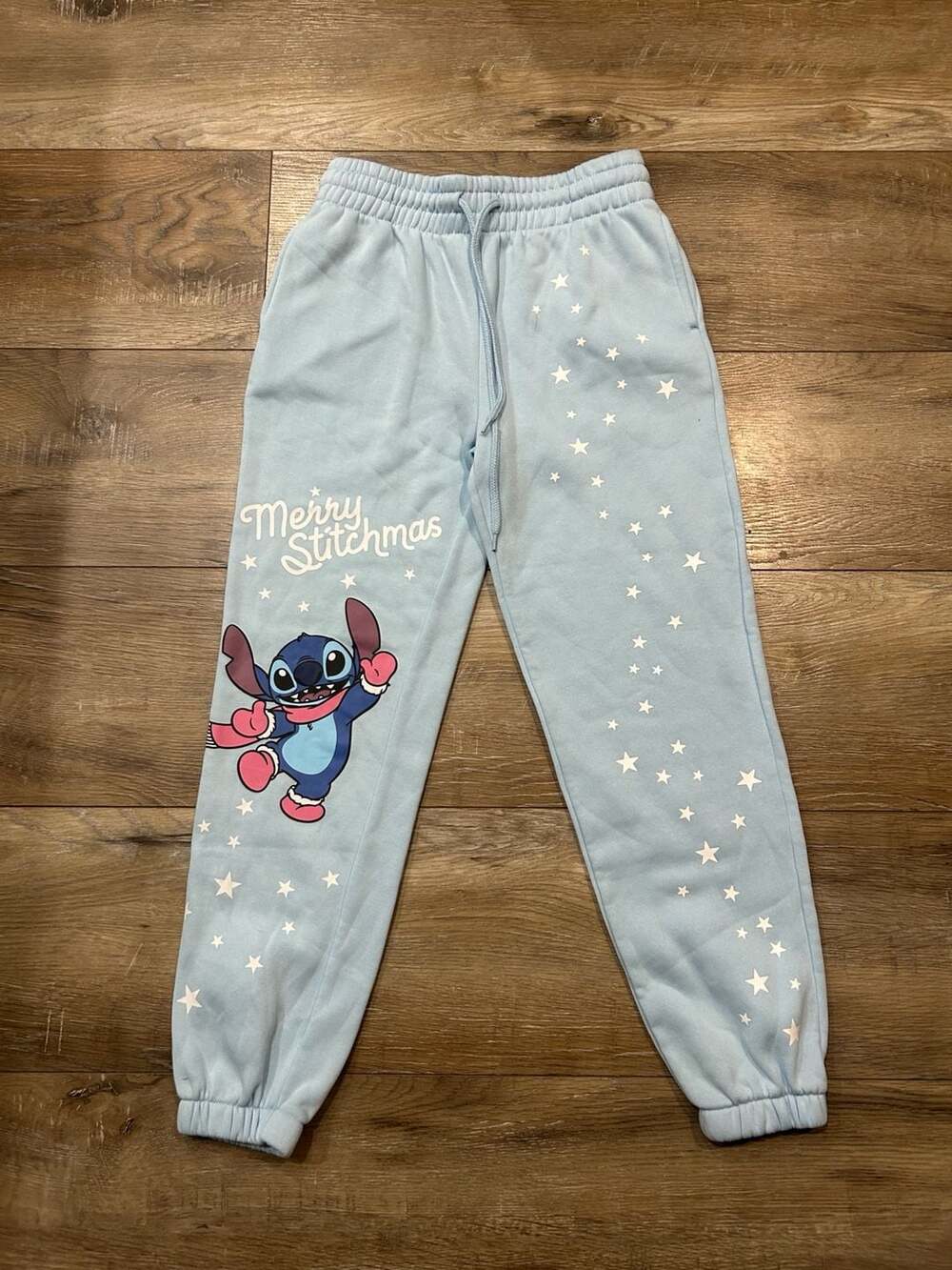 Disney Stitch Women's Merry Stitchmas Graphic Jogger Pants Light Blue Size XS